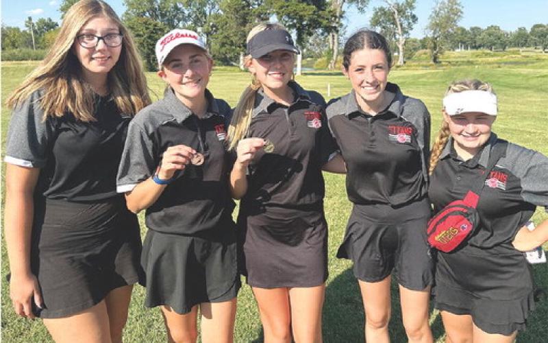 The Columbus Lady Titans travelled to Chanute, Monday, to face their rival, Caney Valley, and five SEK League Schools. Senior, Reese Grundy, came away with the first place medal and junior, Mallory Thompson collected a medal in ninth place to help the Columbus Team finish in fifth place overall in a strong field of lady golfers. Courtesy photo.
