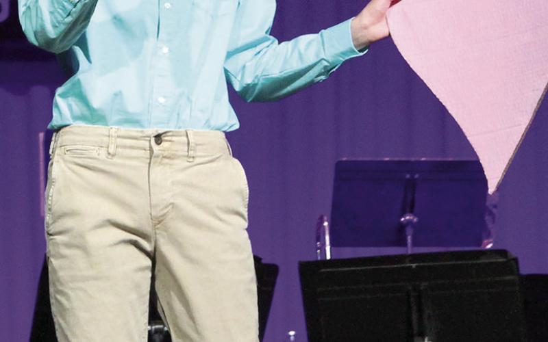 JD Smith sang the theme from “The Love Boat” during the Titan Jazz Band program. The program entitled “Channel Surfing” offered skits from various television shows.