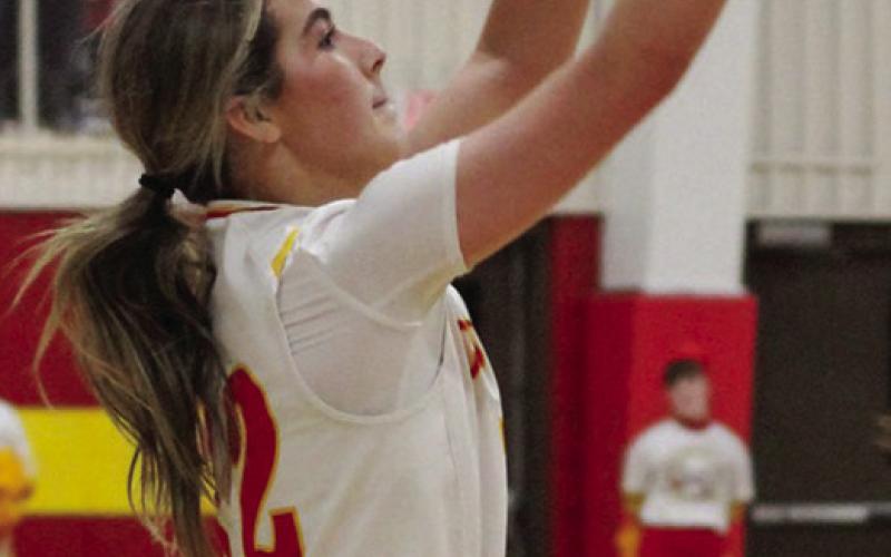 Lady Titan Senior, Ava Harman, shots from the threepoint line in the 59-40 win over College Heights in the MOKAN Tournament, Friday, at the CUHS Gym.