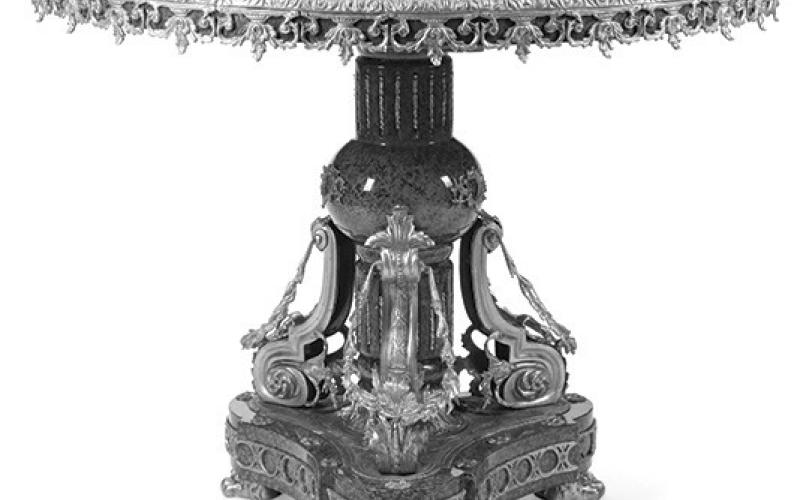 This contemporary table was made in the Napoleon III style, which emerged in France about the same time as the Victorian period in England and America. Like Victorian furniture, it is known for extravagant decorations. Photo Credit: John Moran Auctioneers (c) 2025 by Cowles Syndicate Inc.