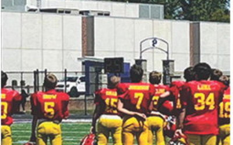 The Columbus Mini Titan Fifth and Sixth Grade Team opened their season, Saturday, in Pittsburg with a 32-0 shut out over Pitt McDade at Hutchinson Field. Columbus will host Arma, tomorrow, for their home opener at Titan Stadium. The fifth and sixth kicks off at noon following the 10 a.m. third and fourth grade game. Courtesy photo.