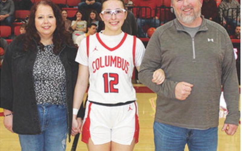 Lady Titan Senior, Torey Tedlock, was recognized during Senior Night Ceremonies, February 21, at the Columbus Unified High School Gymnasium. Torey is a four-year member of the Lady Titan Basketball Team. She was escorted by her parents, Tiara and Corey Tedlock.