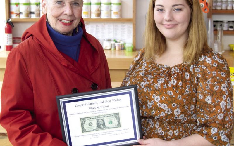 Community welcomes new business with ribbon cutting