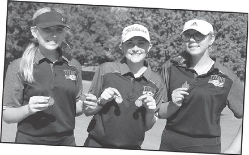 Columbus Invitational Top-ten medalists, senior Reese Grundy, fifth, junior, Mallory Thompson, first, and junior, Anna Head, ninth.