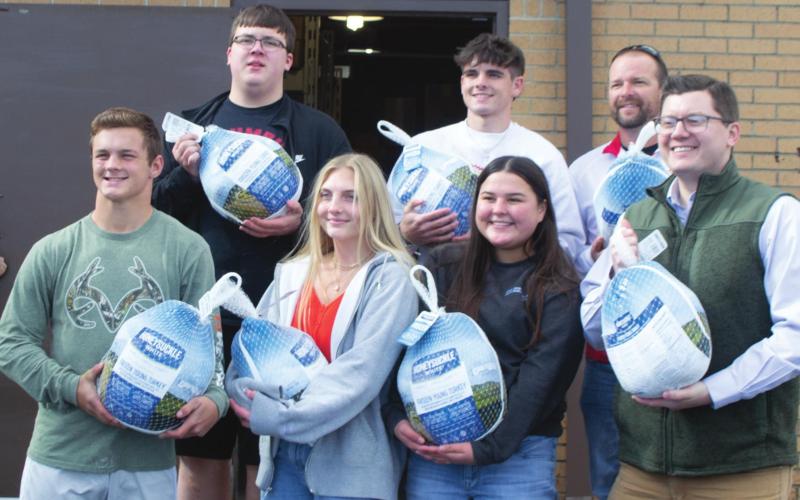 Trent Smith, Lexy Stone, Kate Zahm, Congressman Jake LaTurner, Jonathan Hodgson, Jaxson Haraughty and Jerry Smiley