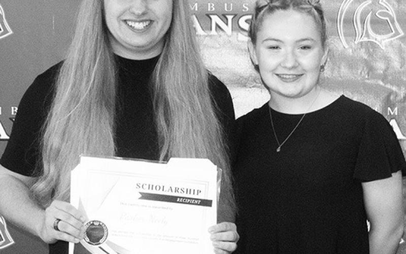 Parker Neely was awarded the 4-H Council Scholarship during the Senior Assembly, May 19, by sister and Council President, Amory Neely, at the Columbus Unified High School Gymnasium.