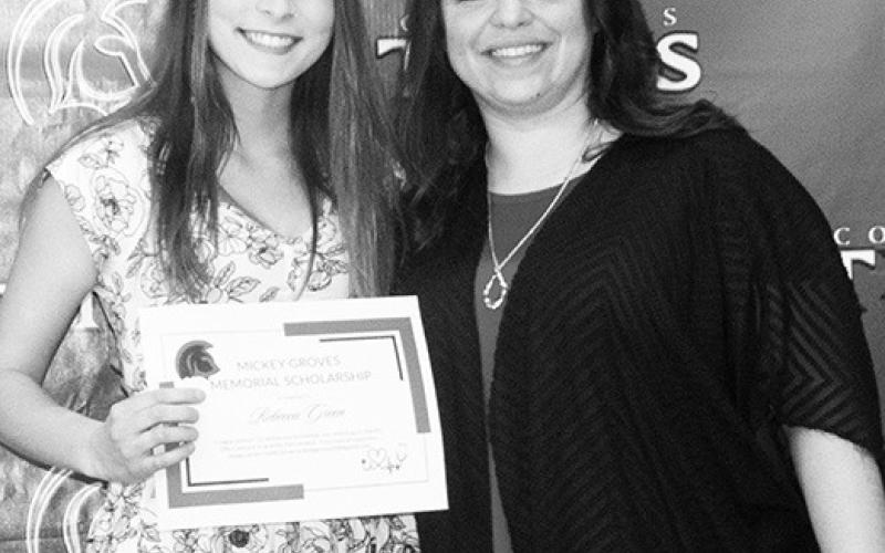 Rebecca Green was the recipient of the Mickey Groves Scholarship in the amount of $500 from Columbus High School Instructor, Laura Boeckman, during the Senior Assembly, May 19 at the CUHS Gymnasium.