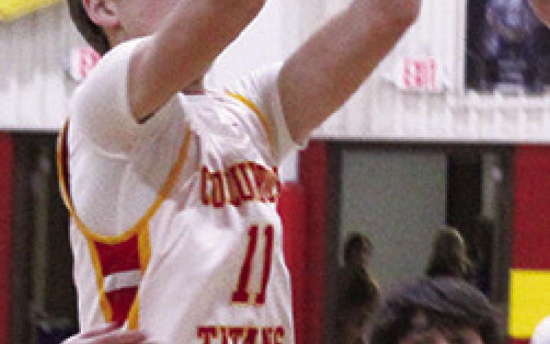 Jonas Stover scored six points including this jumper in the 8A, 18-55, season opening, loss to College Heights Christian School, Tuesday, at the Columbus High School Gym.
