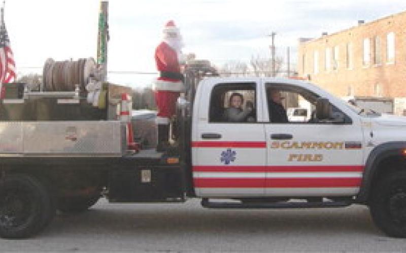 Santa made an early appearance in Scammon Sunday. He was escorted through the parade on one of the city’s fire trucks.