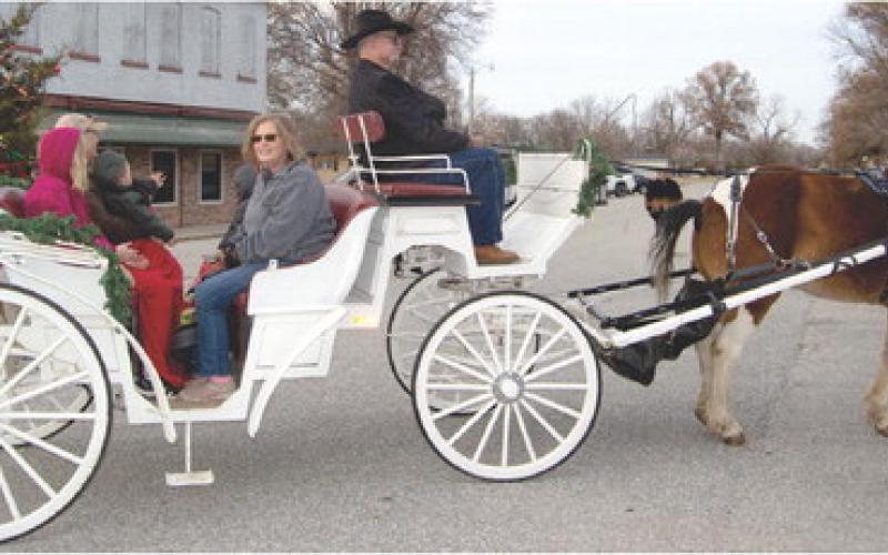 One of the unique entries in the Scammon Christmas parade was this horse and carriage driven by Galen Zook. It was a reminder of Christmases past and provided a nostalgic element to what is often a hectic time time of year.