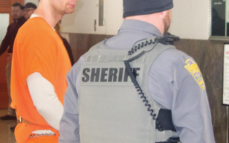Brian Waterman awaits sentencing outside of Cherokee County Courthouse’s courtroom on Tuesday afternoon. Judge Robert J. Fleming sentenced Waterman to 28 years for the first-degree attempted murder, aggravated kidnapping and aggravated burglary incident that involved Bob Hopkins of Baxter Springs on May 8, 2016. Photo by Jacob Spencer.