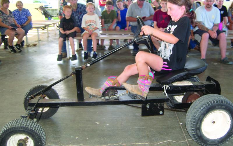Tractors used in the pedal tractor pull vary depending on the age of the entrant. Older children get to try their hand at this tractor. Winners in each division have the opportunity to compete at the Kansas State Fair.