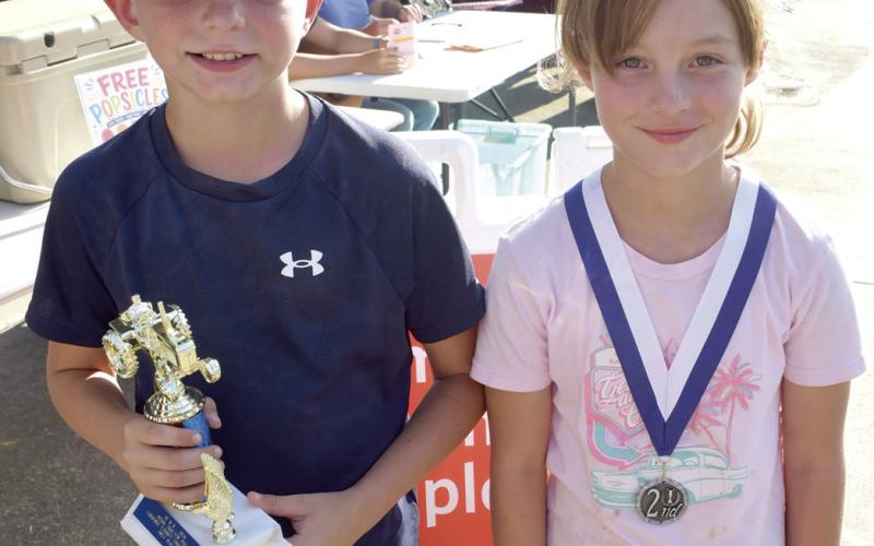 Jaxon Cain placed first in the 10 year old division of the Pedal Tractor Pull with 16’1”. Elizabeth Cain placed second with a pull of 7’.