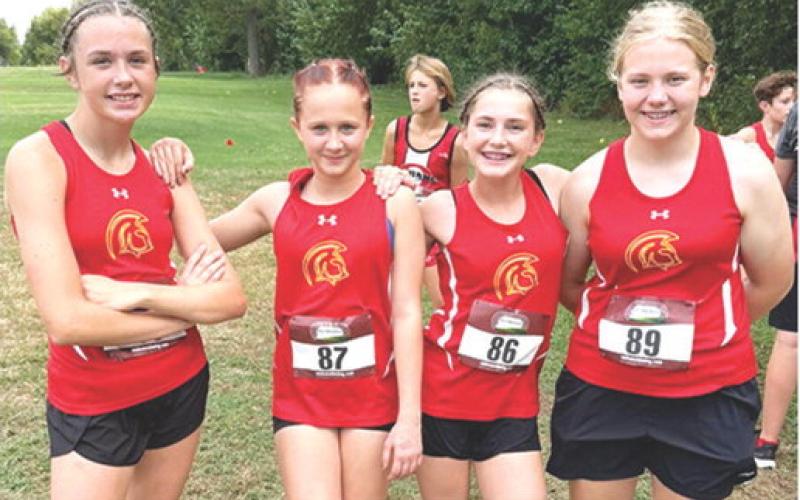 The Columbus Junior High Lady Titan Cross Country Team competed at the Oswego Meet, September 18 at the Oswego Golf Course. Racing for the eighth grade girls team were Sammi Ohmart, first; Hieyla Shelton, fifth; Cora Rider, fourth; and Lydia Wilkins, ninth. The team will host a junior high meet, Tuesday, at the Brush Creek Golf Course in Columbus. The junior high race begins at 3 p.m. Courtesy photo.