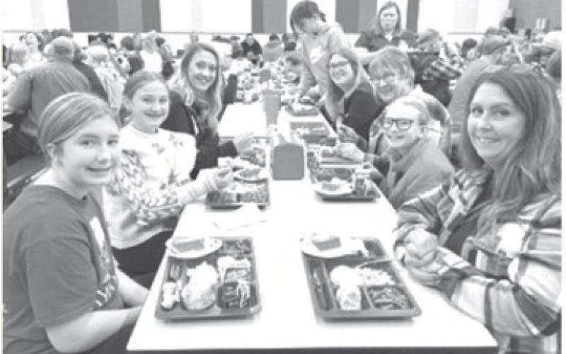 Guests join fifth graders for Thanksgiving lunch