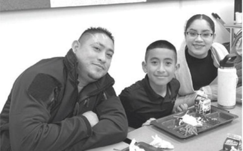 Guests join fifth graders for Thanksgiving lunch
