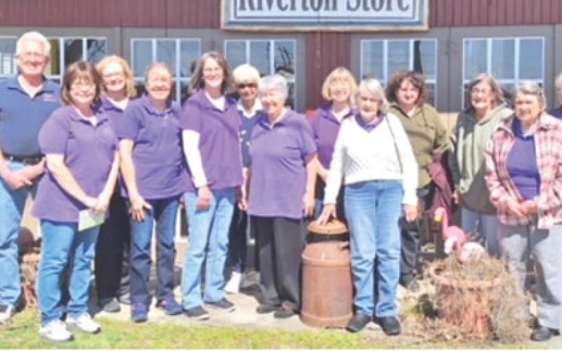 Members of the Sheridan Homemakers held their March 20 meeting at the Riverton Store and helped the owner Scott Nelson, celebrate the 100th birthday of the business. Courtesy photo.