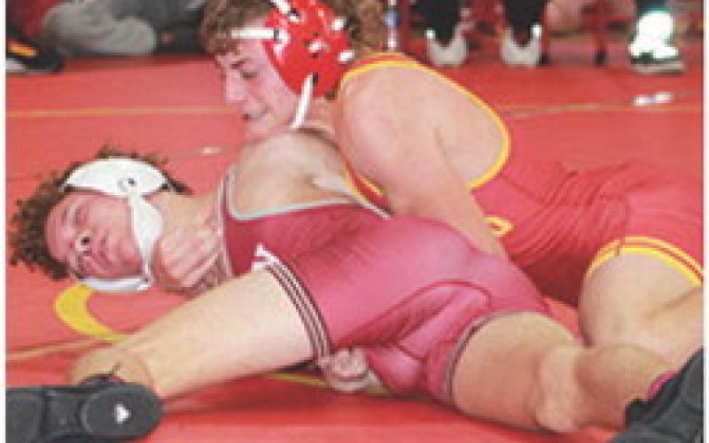 Braun Stone has his opponent under control during the Columbus Duals at the CUHS Gymnasium. The Columbus Titan and Lady Titan Wrestlers are well into their season and will be back on the mats following Christmas Break, January 4 they will host the Pittsburg High School Purple Dragons for girls and boys duals at the Columbus Unified High School Gym. Wrestling will begin at 5 p.m.