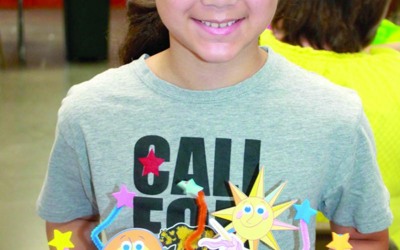 Glittering Stones 4-H Club member Kayelynn Adoremos earned three purple ribbons and a blue ribbon in the Visual Arts and Crafts classes during the cherokee County Fair.