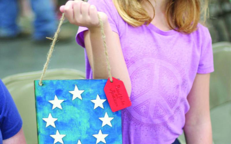 A patriotic piece was entered in the Visual Arts and Crafts division by Eleanor Holt. Holt, a member of the Spring Valley Sparklers, received a purple ribbon and a blue ribbon for her entries.