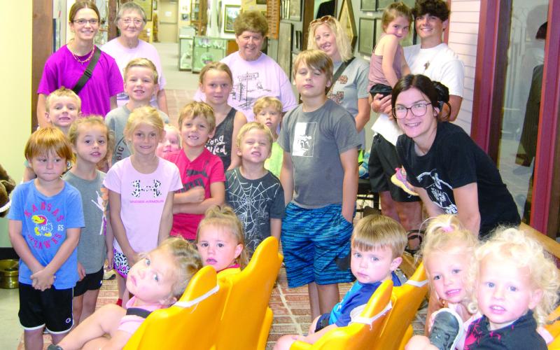Youngsters and staff from Good Shepard Day Care took a field trip to the Columbus Museum recently. Tour guides Doris Richardson and Athena McColm entertained the youngsters with educational information about the various displays and exhibits.