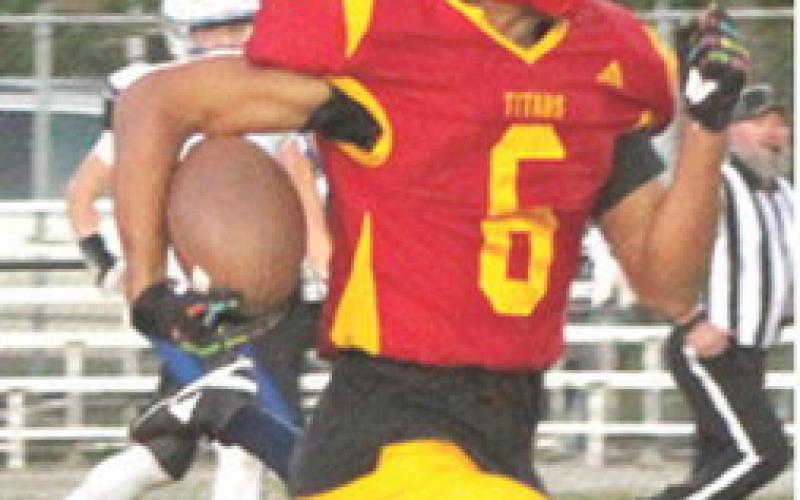 Titan Freshman, Jayden Dohle, scored on a 97-yard, kick-off return to score the only touchdown for Columbus in their 7-70 playoff loss to Topeka-Hayden, Friday in Topeka.