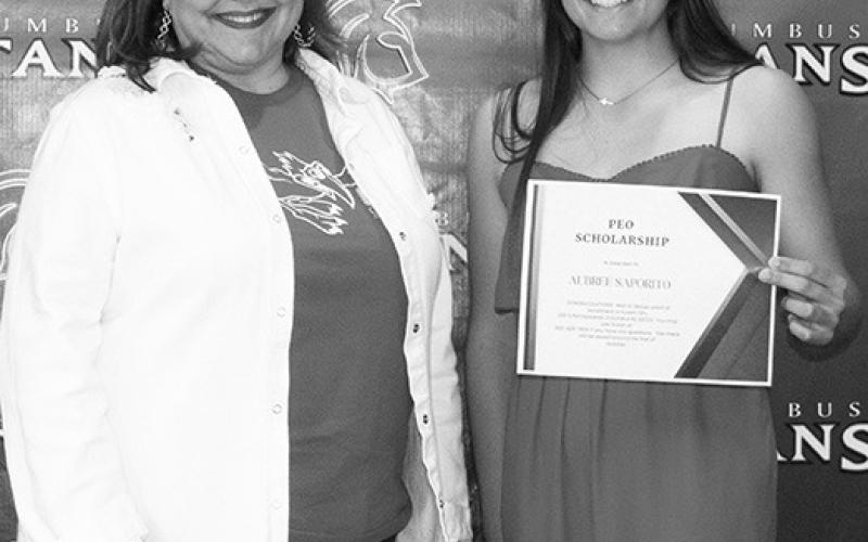 Aubree Saporito was the recipient of the PEO Scholarship in the amount of $500 awarded by Rebecca Stone, during the Senior Assembly at the Columbus Unified High School Gymnasium, May 18.