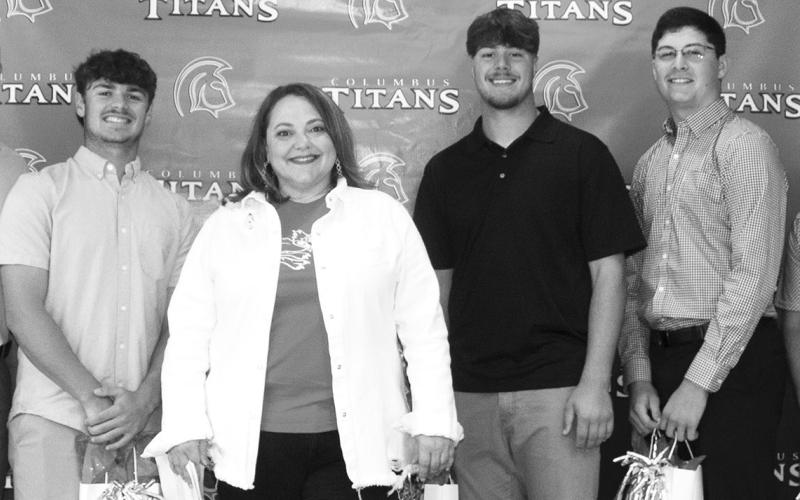 Columbus Unified High School Student Athletes earning scholarships from Coffeyville Community College are Landin Midgett, baseball, Presidential for $6,008; Jaspen Tanner, football Red Raven, $6,000 as the first Titan player to earn a scholarship as a kicker; presenter, Rebecca Stone; Brett Hamilton, football Presidential, $8,008; Cole Minor; and Fischer Troxell, Linemen School. The awards were presented at the Senior Assembly, May 18, at the Columbus High School Gymnasium.