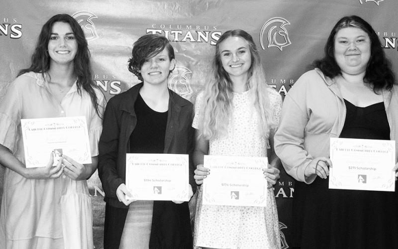 Columbus Unified High School Students receiving scholarships from Labettte Community College are as follows: Kelly Lawson, $3,648 Cardinal Academic Tuition; Jessie Deitz, $4,319 Cardinal Academic, Dana J. Saliva, Books; Korri Combs, $194 Scholarship; Maddie Buergin, $174 Scholarship; and Anastasha Bryant, $271 Scholarship. The awards were presented by Tyler Allen Director of Admissions at Labette Community College, May 18, at the Senior Assembly in the CUHS Gym.