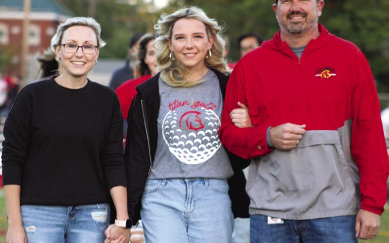 Lady Titan Senior, Reese Grundy, was recognized on Senior Night at Titan Stadium, October 13. Reese is a four-year member of the Lady Titan Golf Team. She was escorted by her parents, Lindsay and Daniel Grundy.
