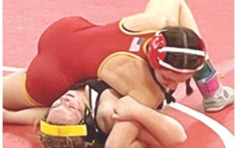 Sophomore wrestler, Montana Ortberg, won by fall over, Josslyn Miller, Fredonia, at the Lady Titan Wrestling opener, Friday. Montana scored seven team points for Columbus in the Kan/Okla Tournament at Caney Valley High School. Courtesy Photo.