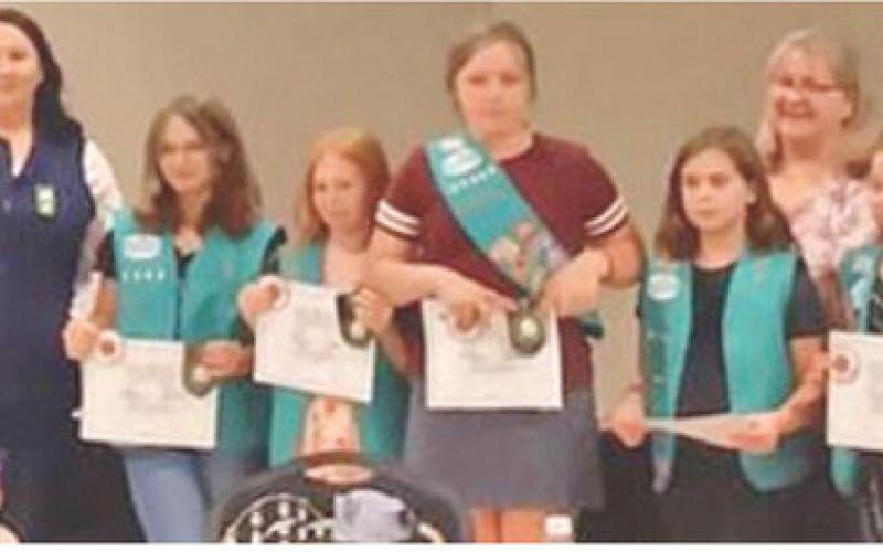 Six Girls in Troop 71303 received the Bronze Award for their project of making improvements to the Columbus Scout House. The girls earning the Bronze Award were Raygen Spoonemore, Jaeclyn Fleshman, Kaydence Lassiter, Karah Crozier, Lilly Linam and Eleanor Holt. They were honored at the Bridging and Awards banquet. Courtesy photo.