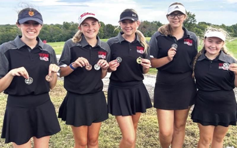 The Lady Titan Golf Team wrapped up their regular season at the Baxter Springs Invitational, Tuesday, taking second in the team standings behind St. Mary’s-Colgan. Lady Titan Junior, Mallory Thompson, placed fourth and freshman, Natalie Wary, placed sixth to finish in the top ten individually. Team members are Natalie Wary, Mallory Thompson, Reese Grundy, Anna Head, and Amory Neely. Courtesy Photo.
