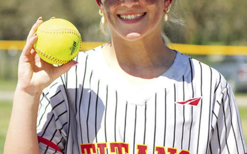 Tatum Kirk’s two run, home run in the bottom of the fifth inning gave the Lady Titans an exciting, 10-9, victory against Diamond, Mo. March 29, in a tournament held at the Columbus Community Field Ballpark. Courtesy photo.