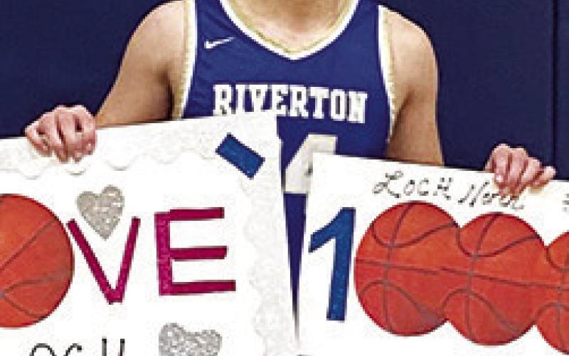 Loch North, Riverton Ram Senior, scored his 1,000 career point in a recent game home game. North and the Ram Squad were in Caney last night to take on Frontenac in the Kansas Class 3A Sub-State Semi-final game. Scores were not available at press time. (Courtesy photo.)