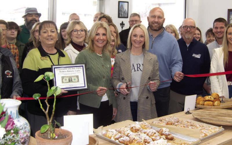 Members of Baile’s family joined her in accepting the Chamber of Commerce “First dollar of Profit,” plaque from the chair of the Ambassador Committee Sonja Duley. The family members present at the ribbon cutting were Mckenzie Winterhalter, Greg Winterhalter Jay and Rhonda Hatfield, Bailie Saiz and husband Jacob Saiz.