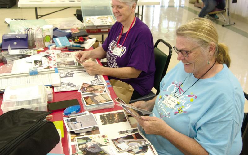 Columbus resident and well known scrapbooker Debra Messer has attended several of the annual events. Messer has several scrapbooks on the history of the Columbus Hospital and the employees working their over the years. Brenda Qualls works on her scrapbook at the same table with Messer.