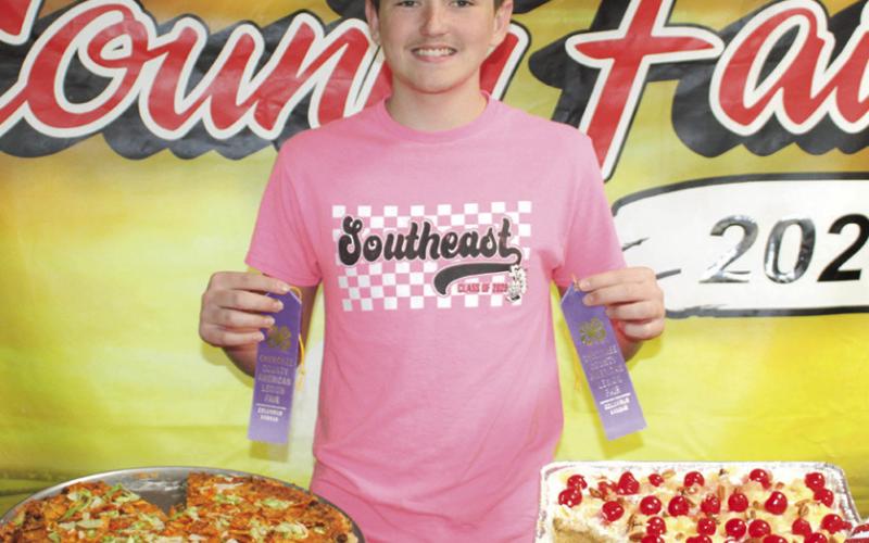 Cody Vineyard was awarded purple ribbons for his pizza and dessert dish at the foods show held July 6.