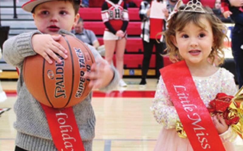 Little Mr. and Miss Holiday contest returned to Baxter Springs this Christmas. Elijah Fidler was named Little Mr. Holiday and Little Miss Holiday went to Layla Fry. Their awards were presented during the halftime performance at the Baxter Springs High School Boys Basketball game Friday night. Both of this year’s winners are three years old. Elijah Fidler was the Top Seller, selling over 800 tickets. Photo by Dee Riley.