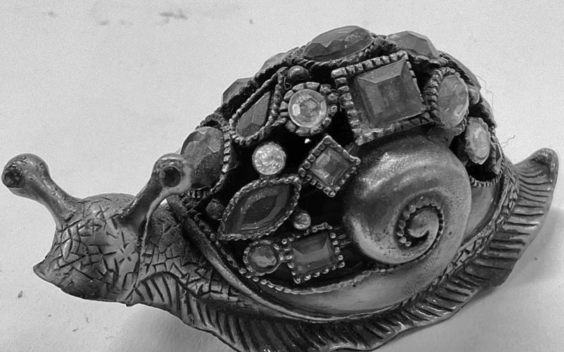 Despite negative associations, snails often in decorative arts