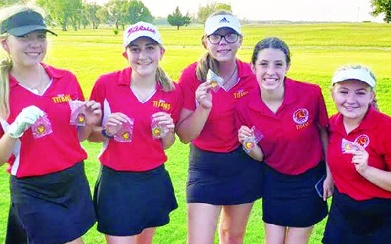 The Lady Titan Varsity Golf Team opened their season on the Oswego Golf Course for the Labette County High School Tournament, Tuesday. The Columbus Team placed third after losing a tie breaker to Chanute. Lady Titan Senior, Reese Grundy, placed second and junior, Mallory Thompson, took top medalist in the SEK League dominate field. Paige Patton, Natalie Wary and Avery Neely, added their scores to the team total.