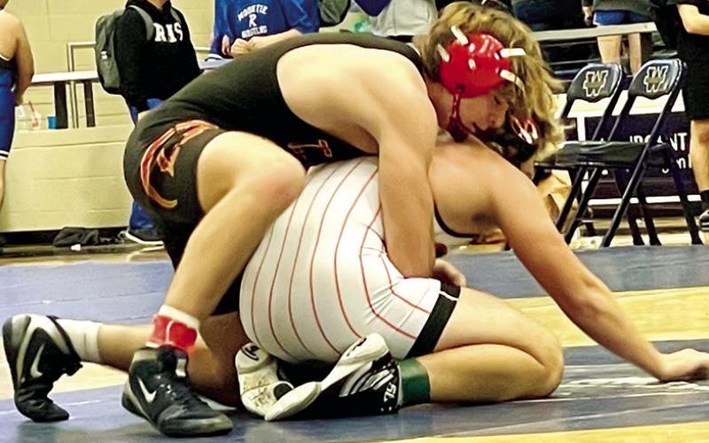 Freshman, Mason O’Banion has control in his championship match to win the 175-pound weight class for the Titan Team at the Bentonville West HIgh School Tournament, Saturday, in Certerton, Ark. Photo courtesy of Amanda Stone.