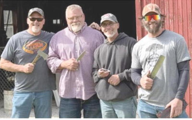 Four Columbus knife enthusiasts were prize winners at the recent Kansas Custom Knife Makers Association meeting on April 19th at the Dickinson County Heritage Center in Abilene. Todd Murdock the unofficial best ax award, Phil Evans best hunter award and best of show, Mike Pace best folder and Kurtis Baylor won the best knife competition and the cutting competition. Courtesy photo.
