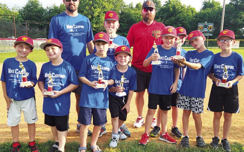 Mike Carpino Ford Team was the winner of the 8U Coach Pitch Division in the Columbus Cal Ripken League. Team members picking up their trophies at the league’s closing ceremony, Tuesday, are: Conner Dowell, Parker Stover, Xander Newman, Wyatt Linn, Jaxson Harper, Lyden Atkinson, Jase Mooney, and Dayton Hughes. Coaches for the team are Hazen Hale and Caleb Linn. Courtesy Photo.