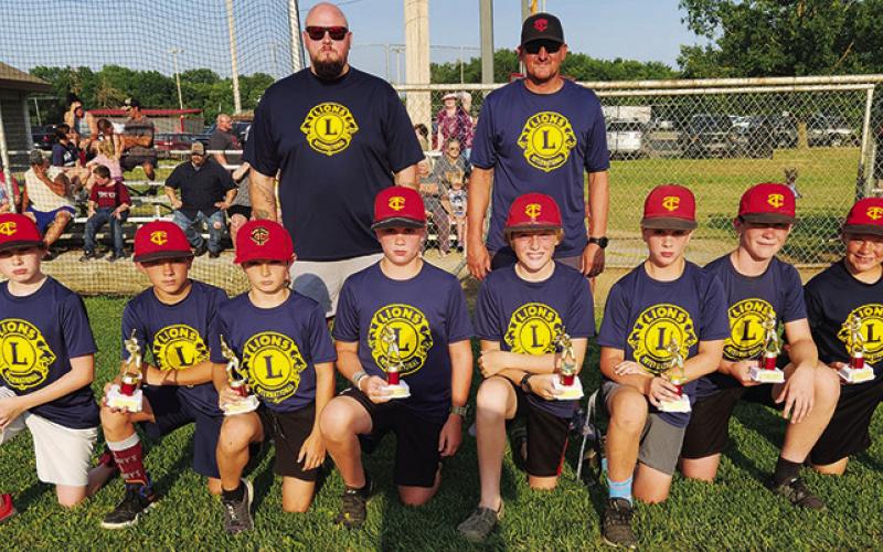 The Columbus Cal Ripken Major League Champions received their trophies at the league closing ceremonies, Tuesday, on Volunteer Field at the Columbus Community Field Ballpark. Members of the championship team are: Kole Skahan, Cam Carter, Tanner Scott, Brogan Hutto, Ty Anderson, Boston Hutto, Isaiah Williams, and Keegan Blackledge. Jax Sharpe was unable to attend. Coaching the team is Anthony Hutto and Bobby Carter. Courtesy Photo.