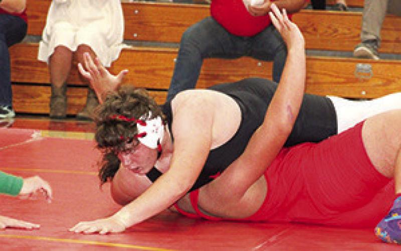 Kash Smith won both of his matches by pin, Tuesday, against Parsons and Carl Junction, Mo. for the Titan Junior High Wrestling Team. Columbus is hosting an invitational tournament tomorrow at the CUHS Gym. Wrestling begins at 8 a.m.