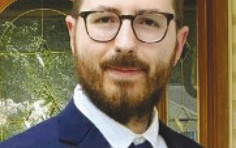 Robinson graduates with degree in law