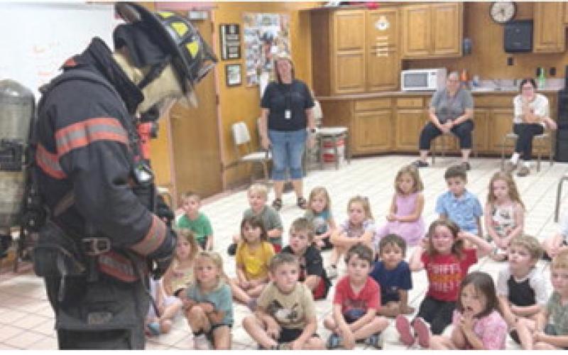 Park Pre-K students got to see the complete outfit firefighters wear during the course of their job. Students toured the station during Fire Prevention Week. Courtesy photo.