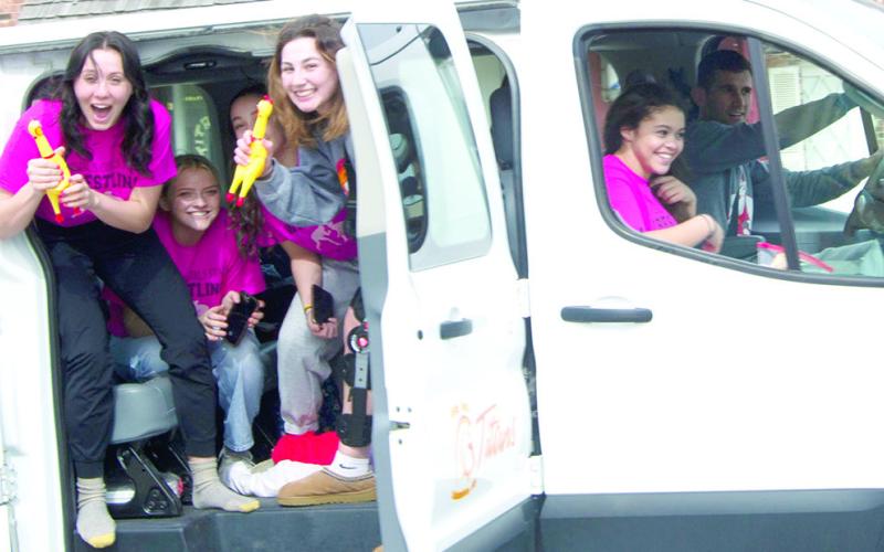 Lady Titan Wrestlers heading to the Kansas Class 4-1A Girls Wrestling State Tournament enjoyed a send off parade for both the girls and boys teams. Senior, Katie Simpson, junior, Emily Britt, freshman, Hannah Noel, senior, Madelyn Garcia, and senior, Brooklyn Lima, were driven to Salina by Titan Head Wrestling Coach, Marcus Bowman. The tournament will take place Thursday through Friday at the Tony’s Pizza Event Center.