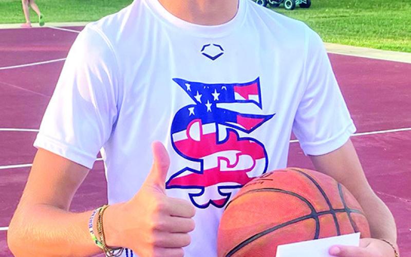 Jonas Stover was the winner in the sixth through eighth grade division of the free throw contest at the Freedom Fest in the Columbus City Park, July 8. Courtesy Photo.